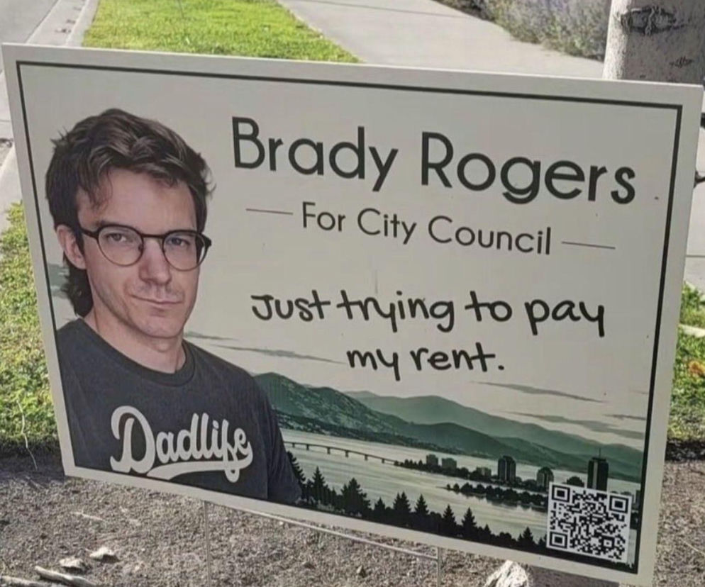 Baner wyborczy Brady'ego Rogersa z hasłem o płaceniu czynszu. O nietypowej kampanii radnego przeczytasz w Eska.