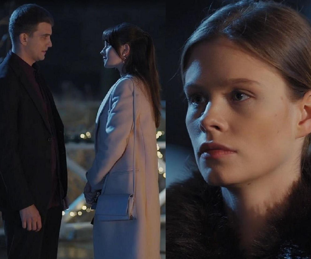 Mateusz (Rafał Kowalski) i Bogna (Sherazade Wolff) stoją naprzeciwko siebie w scenie z serialu M jak miłość. Po prawej stronie widać Majkę (Matylda Giegżno) z zazdrosną miną, w tle rozmazane światła. Więcej o ich losach na Super Seriale.