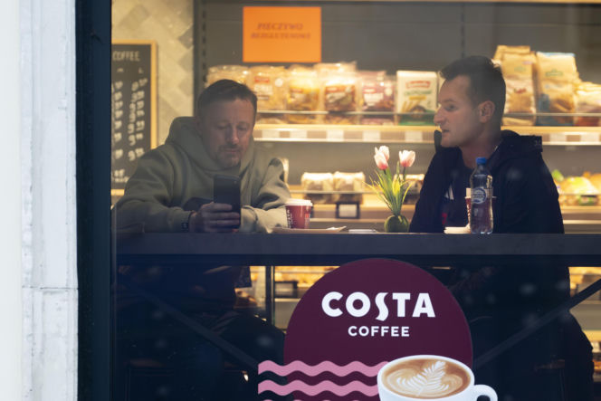 Adam Małysz z przyjacielem na kawie po spotkaniu z Prezydentem