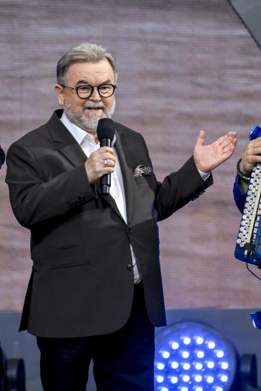 Zespół Enej i dziennikarz Edward Miszczak 