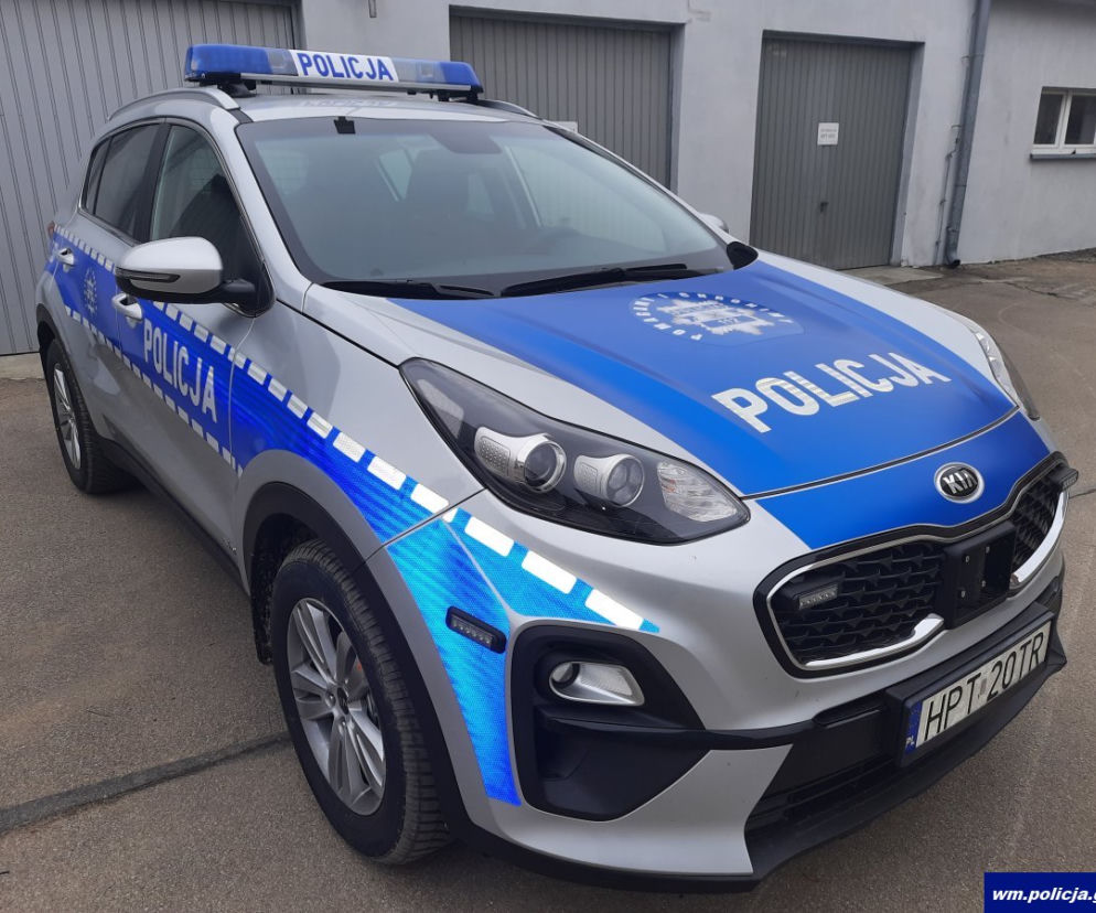 Oznakowana policyjna Kia Sportage