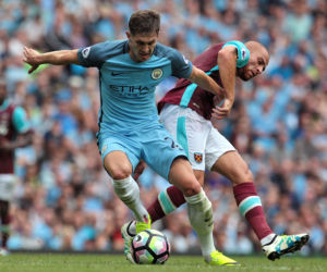 Piłkarze Manchesteru City i Manchesteru United