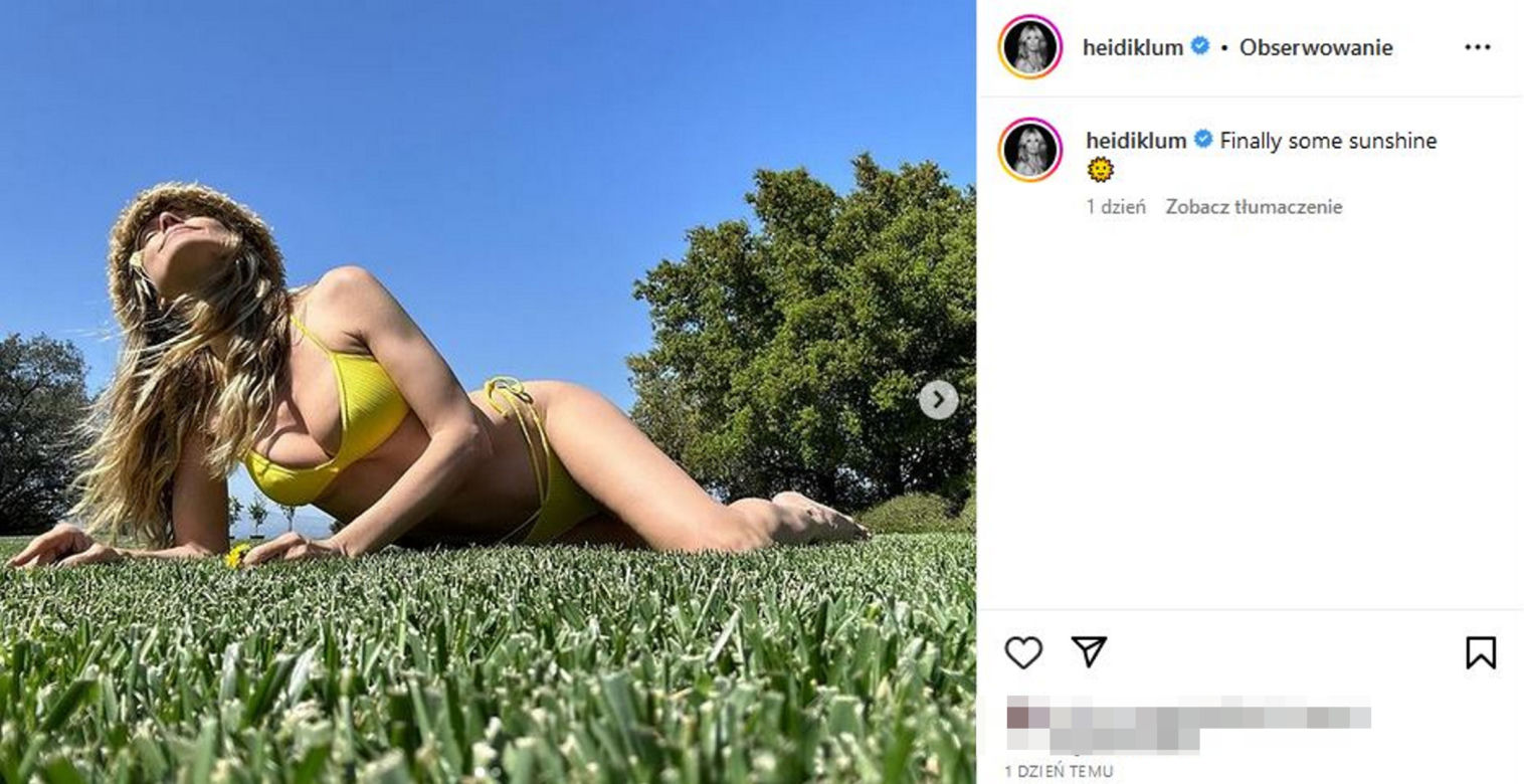 Heidi Klum półnago wygina się na trawie. Ma futrzaną czapę i kuse bikini. Co się dzieje z jej biustem?!