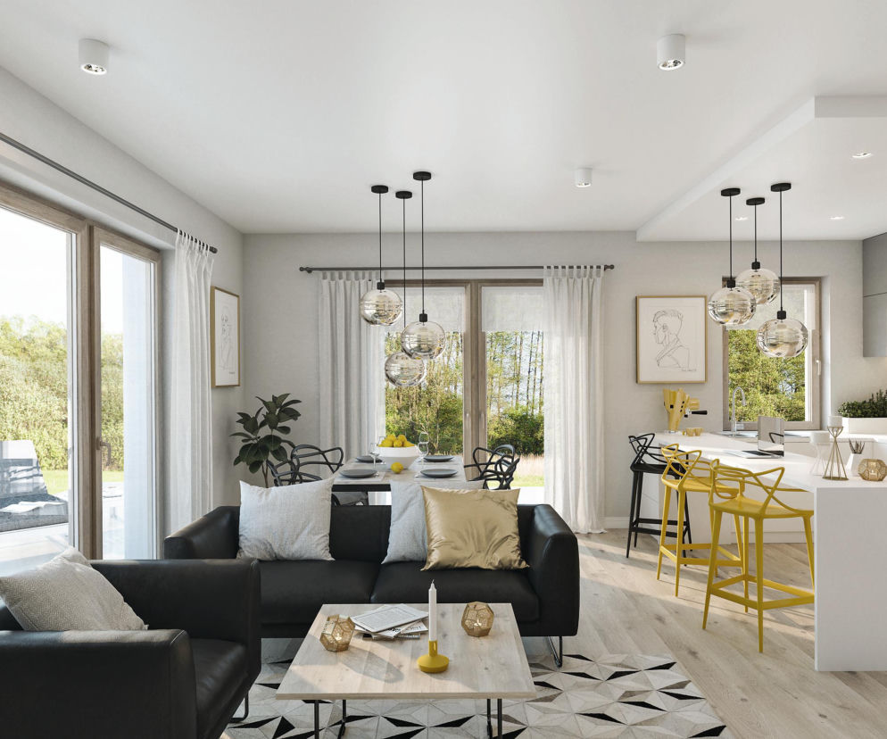 Nowoczesny salon z aneksem kuchennym i jadalnią. O cenach usług architekta wnętrz przeczytasz na Muratordom.