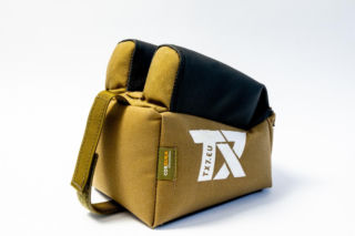 Haitański Krawiec szyje świetne worki strzeleckie