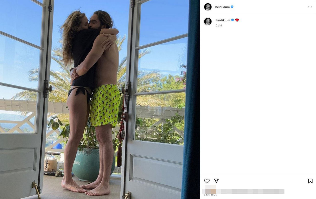 Heidi Klum półnago wygina się na trawie. Ma futrzaną czapę i kuse bikini. Co się dzieje z jej biustem?!