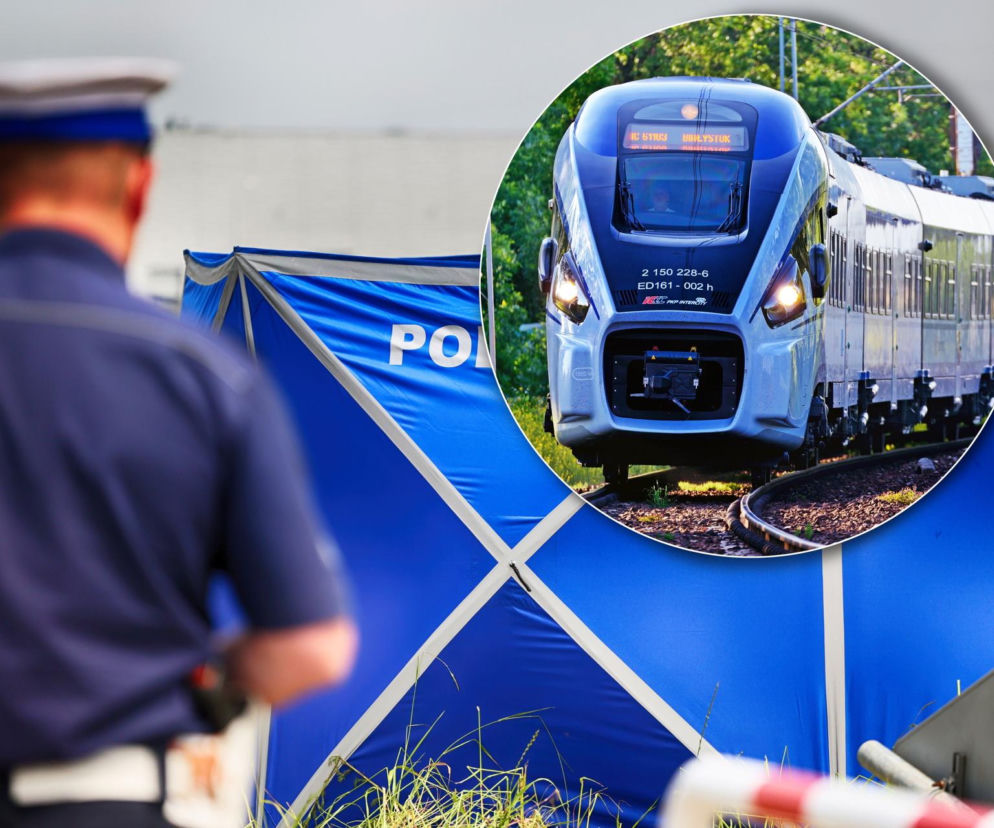 Policjant przy niebieskim parawanie. Na miniaturze pociąg Intercity. O wypadku w Bydgoszczy przeczytasz na SE.