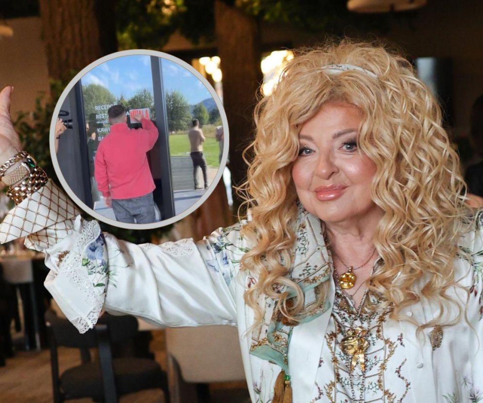 Magda Gessler uśmiecha się. Na miniaturze Książulo naklejający naklejkę MUALA. O sukcesie restauratorki czytaj na SE.