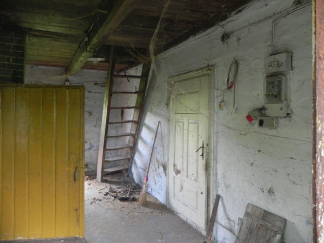 Remont drewnianej chaty w Bełdnie