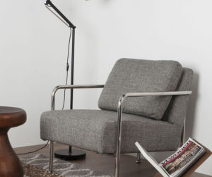 Designerski szary fotel na stalowych rurkach