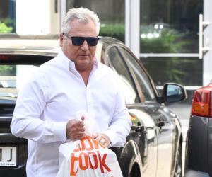 Aleksander Kwaśniewski zakupy w księgarni