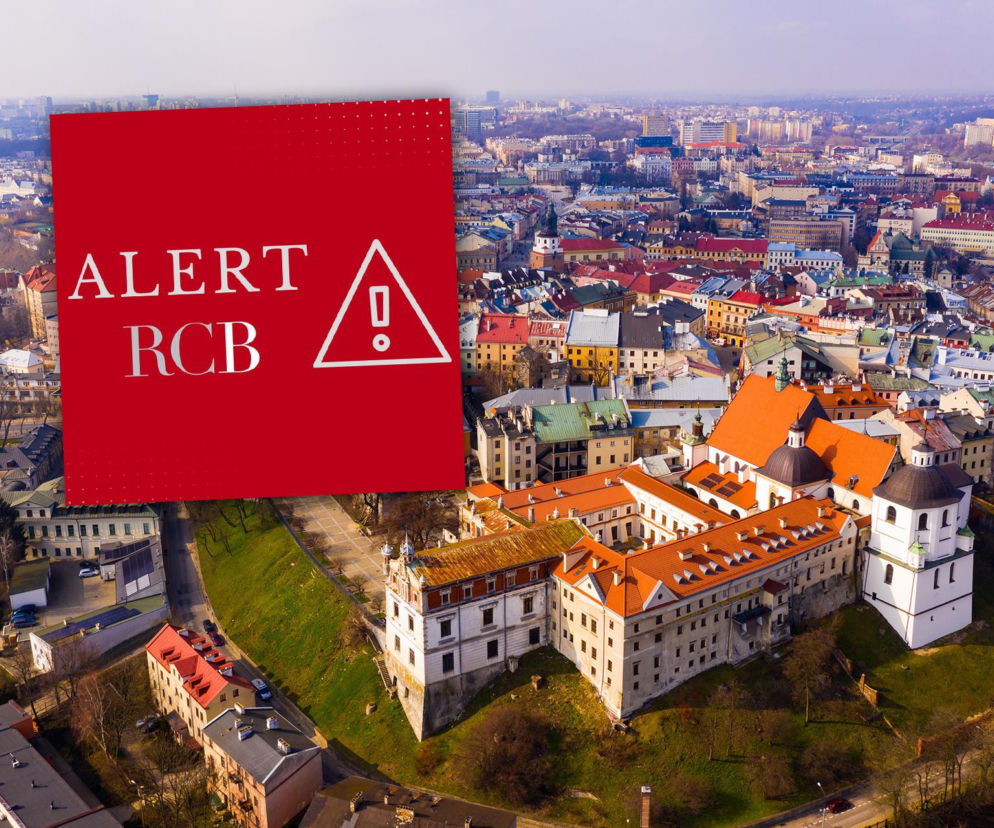 Panorama Lublina z lotu ptaka. Na wstawce czerwony znak Alert RCB. O zmianach w systemie ostrzegania czytaj na SE Portal Obronny.