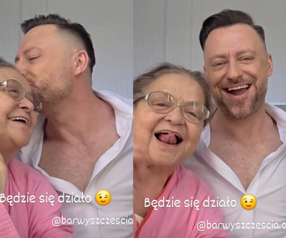 Aktor Adam Szczyszczaj (Wilk) całuje w czoło aktorkę Grażynę Zielińską (Lucyna) oraz oboje uśmiechają się i śmieją do kamery, zapowiadając nowy sezon Barw szczęścia. Ich radość odzwierciedla triumf bohaterów nad Pyrkami, o czym można przeczytać na Super Seriale.