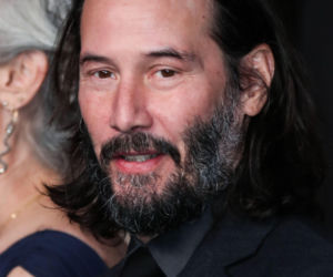 Keanu Reeves z partnerką