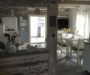 Remont drewnianej chaty w Bełdnie