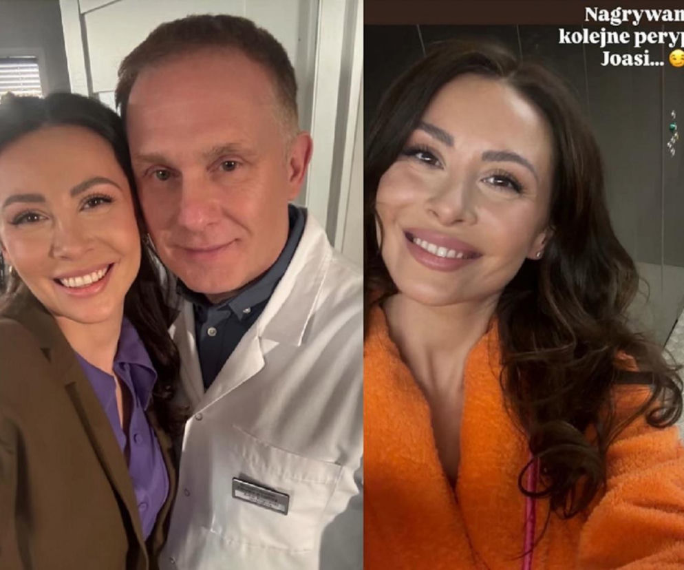 Dominika Sakowicz i Robert Moskwa w scenie z serialu M jak miłość. Aktorzy uśmiechają się do zdjęcia, a Moskwa ma na sobie biały kitel lekarski, co zapowiada nowe perypetie w przychodni Rogowskiego. Więcej o ich losach na Super Seriale.