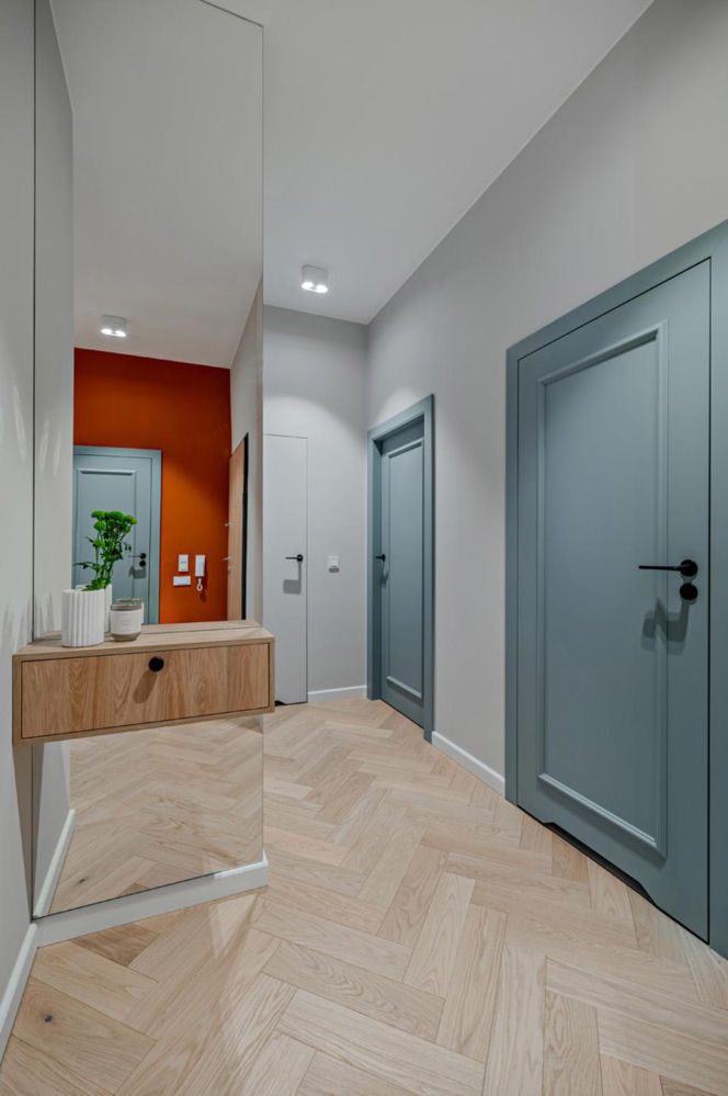 Mieszkanie w kolorach szałwiowej zieleni i ciepłej terakoty