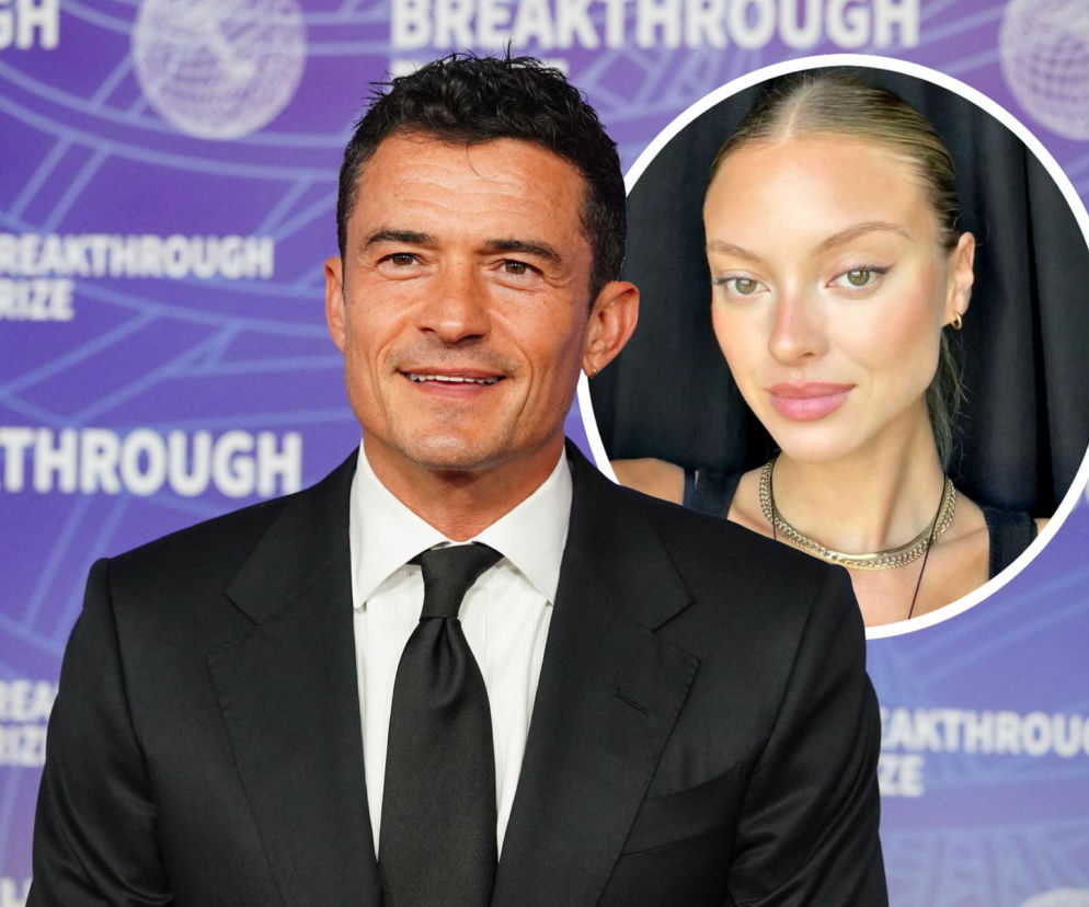 Uśmiechnięty aktor Orlando Bloom w garniturze z krawatem i młoda modelka Luisa Laemmel z blond włosami, kolczykami kołami i złotym naszyjnikiem. O nowym związku aktora po rozstaniu z Katy Perry możesz przeczytać na naszym portalu.