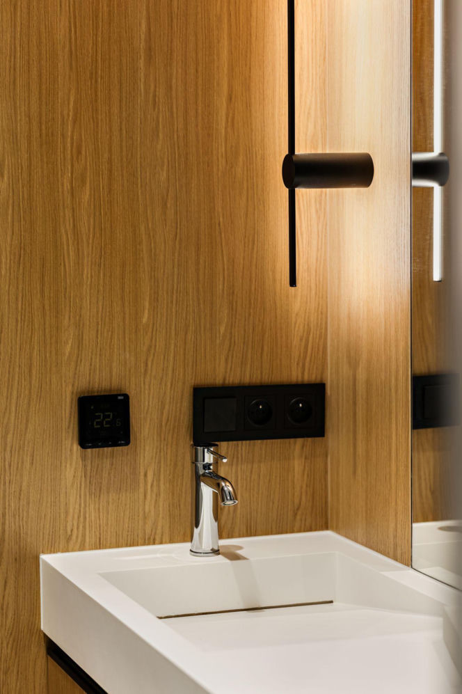 Między minimalizmem a złotym detalem. Elegancki dom w Katowicach