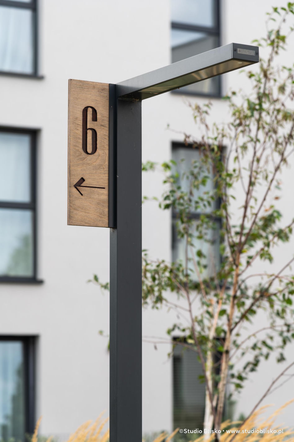Wayfinding dla apartamentów Naturia w Toruniu 