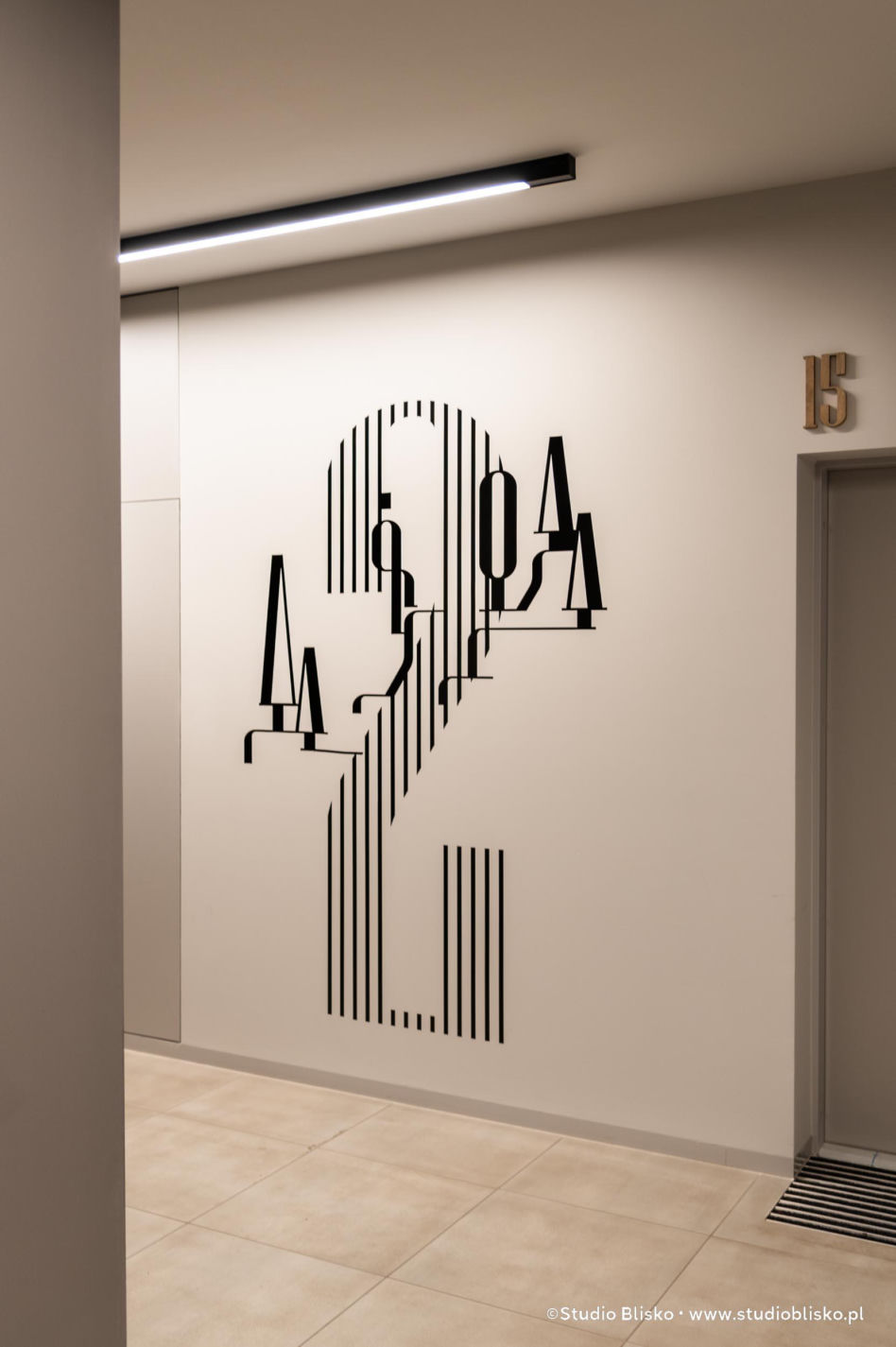 Wayfinding dla apartamentów Naturia w Toruniu 