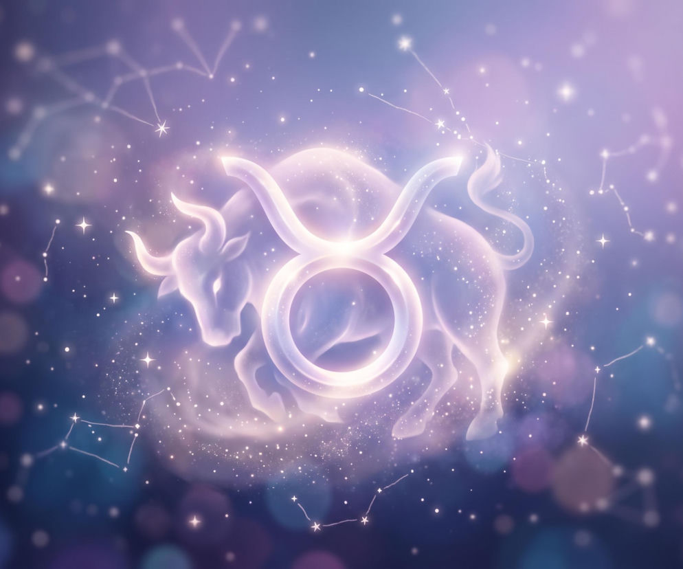 Świecący symbol zodiakalnego Byka na tle gwieździstego nieba. O horoskopie dla Byka przeczytasz na Eska.