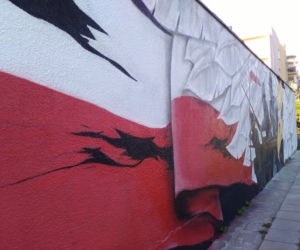 Nowy mural w Rzeszowie - orzeł w koronie, żołnierze i flaga na osiedlu Pobitno