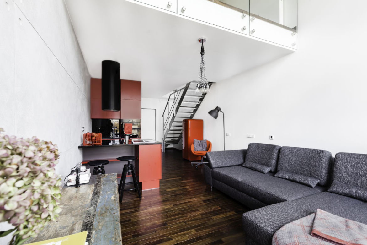 Loft w kolorach betonu i cegły