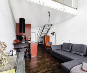 Loft w kolorach betonu i cegły