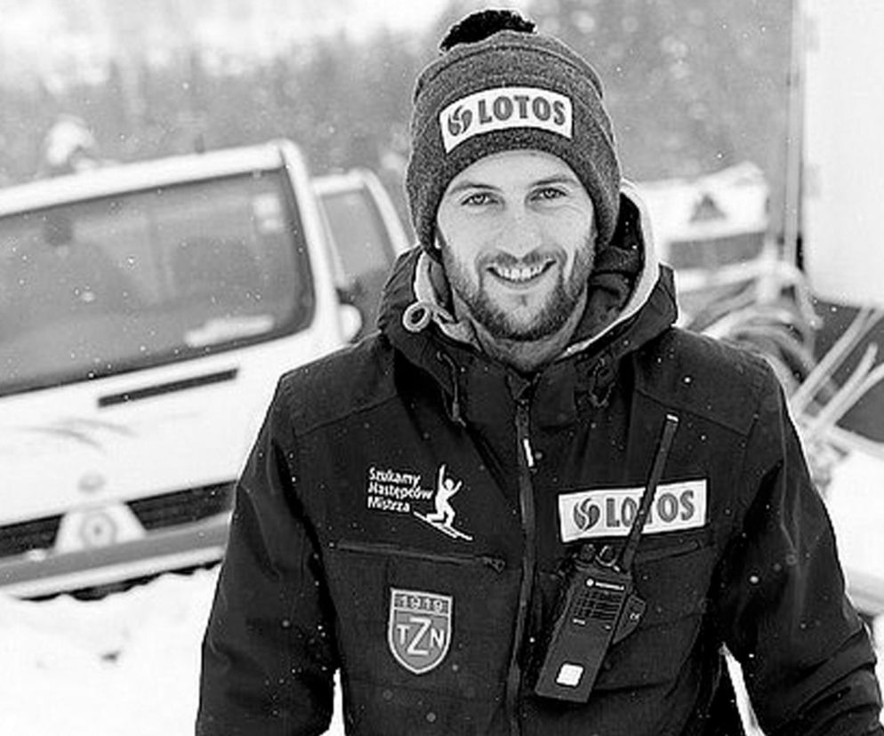 Uśmiechnięty Grzegorz Miętus w zimowej czapce i kurtce trenerskiej. O śmierci skoczka przeczytasz na SE Supersport.
