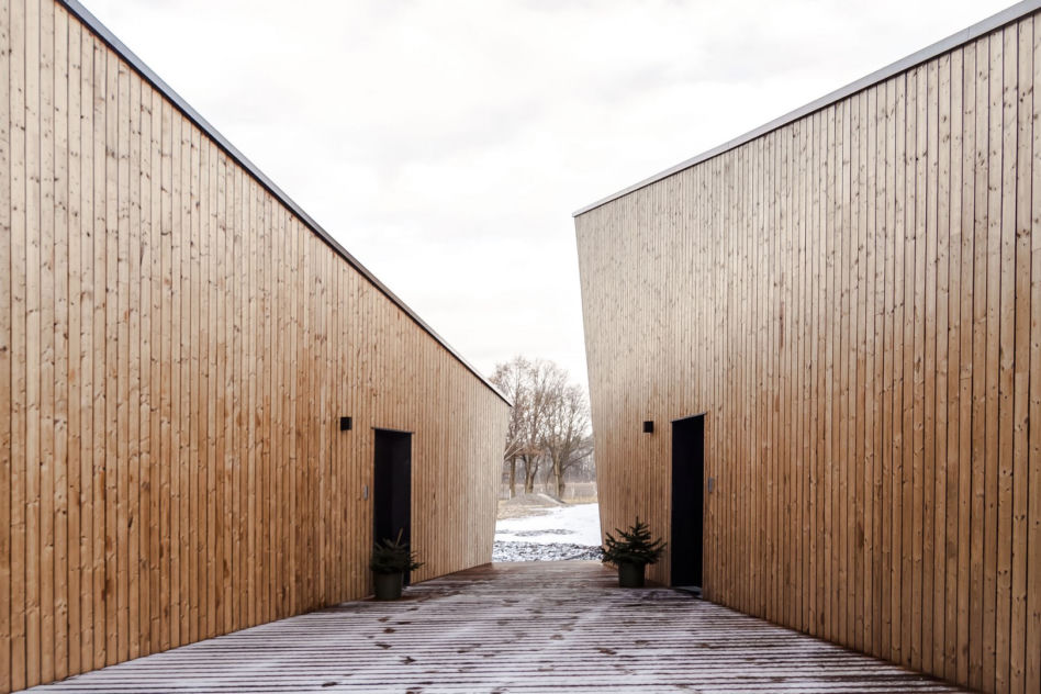 Cichosza: zespół całorocznych domków w Szydłowie projektu Modernstudio