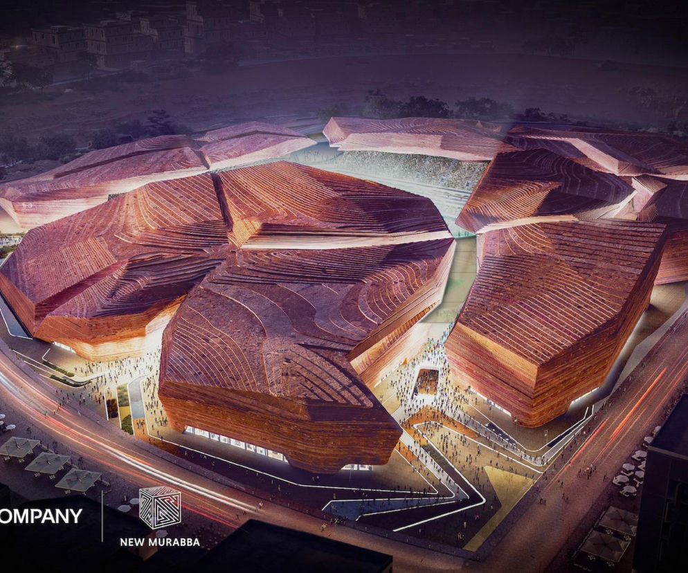 Wizualizacja projektu New Murabba w Arabii Saudyjskiej, prezentująca monumentalne budynki o falujących, piaskowych fasadach i dynamicznych liniach światła w nocy. Architektura Murator Plus opisuje ten futurystyczny kompleks jako część nowej dzielnicy Rijadu.