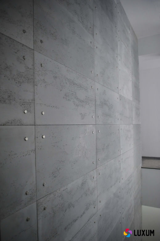 Beton architektoniczny - płyty betonowe na ścianie LUXUM