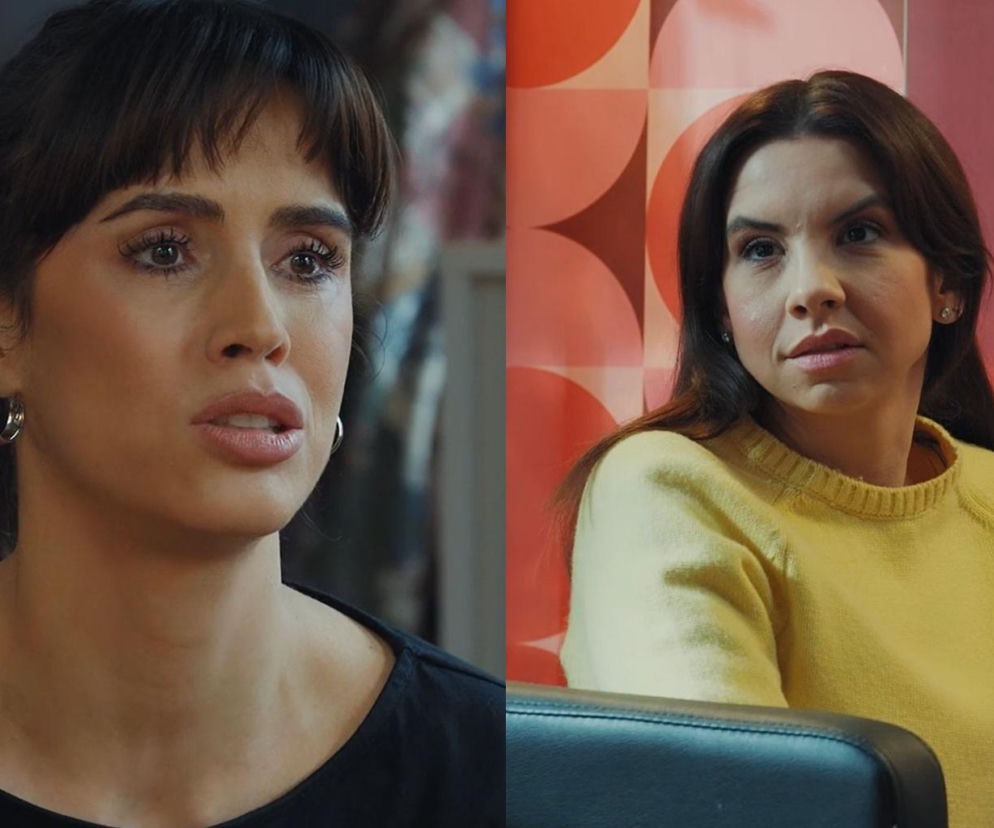 Kama (Michalina Sosna) w czarnej bluzce z kolczykami w kształcie srebrnych kółek rozmawia z Anetą (Ilona Janyst) w żółtym swetrze, siedzącą w fotelu w salonie fryzjerskim. Obie aktorki z M jak miłość przedstawiają emocjonalną scenę, o której można przeczytać na Super Seriale.