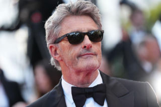 Paweł Pawlikowski z żoną na czerwonym dywanie. Małgorzata Bela skradła show