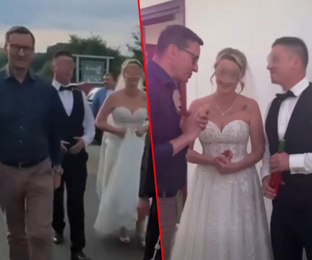 Mateusz Morawiecki z parą młodą. Na wstawce obok polityk składa życzenia nowożeńcom. O wizycie przeczytasz na SE.