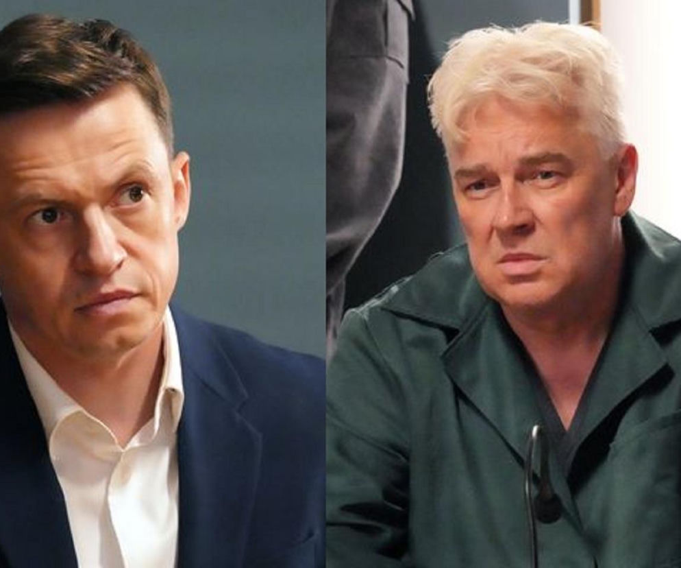 Piotr Ligienza jako Modrzycki w ciemnej marynarce i białej koszuli obok Zbigniewa Stryja jako Grada w zielonej koszuli z białymi włosami, obaj w kadrze od ramion, z poważnymi wyrazami twarzy. Zdjęcie ilustruje odcinek serialu Barwy szczęścia, o którym przeczytasz więcej na portalu Super Seriale.