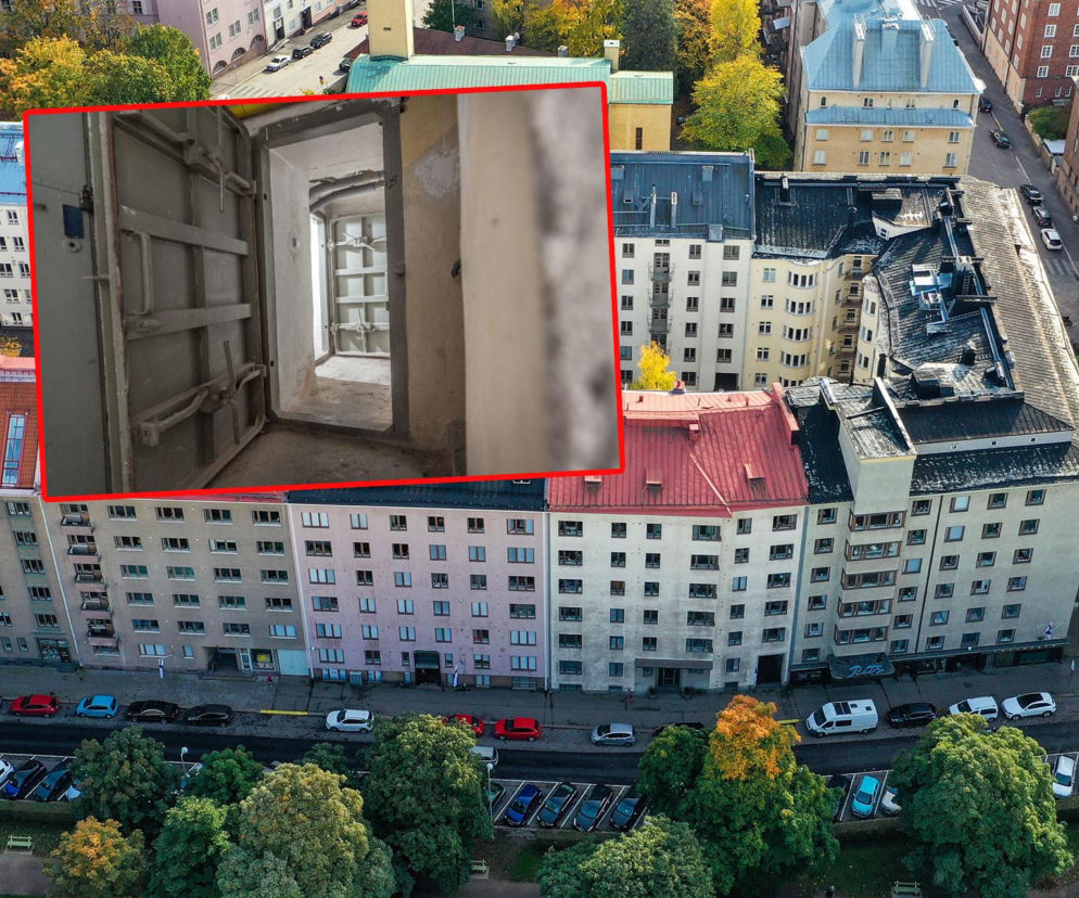 Widok z góry na budynki mieszkalne. Na miniaturze otwarte drzwi do schronu. O cenach mieszkań przeczytasz na SE Superbiz.