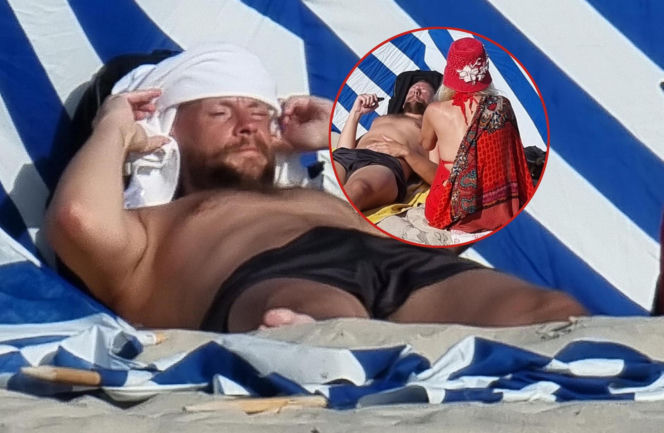 Sebastian Fabijański ukrył tajemniczą blondynkę za parawanem w Juracie. To robili na plaży 
