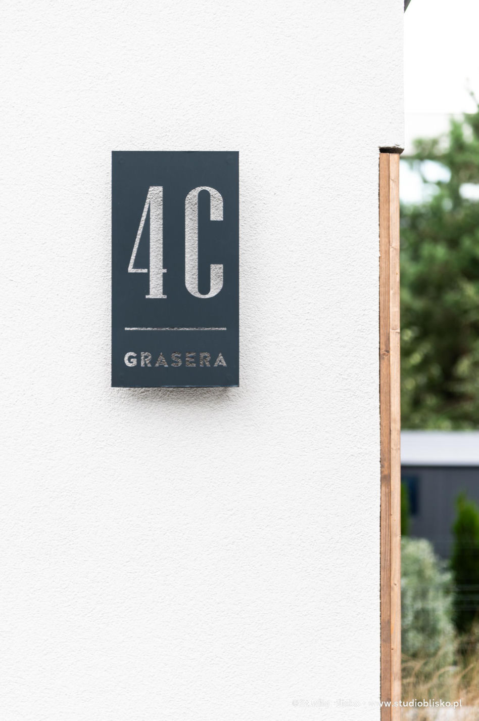 Wayfinding dla apartamentów Naturia w Toruniu 