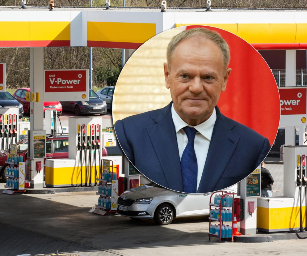 Stacja paliw Shell z dystrybutorami i zaparkowanymi samochodami; na pierwszym planie, w okrągłej ramce, portret Donalda Tuska w garniturze. Temat obniżonej akcyzy na paliwo znajdziesz na Super Biznes.