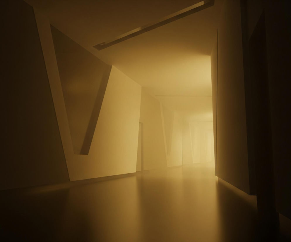 Długi korytarz, oświetlony ciepłym, żółto-pomarańczowym światłem, rozciąga się w głąb obrazu. Ściany i sufit mają nieregularne, geometryczne kształty, tworząc abstrakcyjną przestrzeń. Światło staje się jaśniejsze w miarę oddalania się w głąb korytarza, a podłoga ma błyszczącą, odbijającą światło powierzchnię. Po prawej i lewej stronie widoczne są ciemniejsze obszary, co potęguje wrażenie głębi i perspektywy.