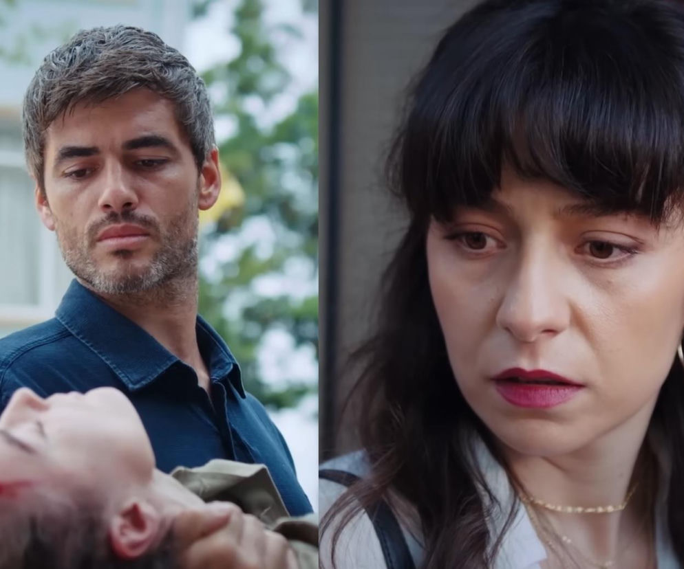 Poyraz niesie ranną Nanę, na jej skroni widoczne ślady krwi, w tle błękitna ściana budynku. Po prawej stronie Sibel z zmartwioną miną. Zdjęcie ilustruje dramatyczny powrót bohaterów z serialu Dziedzictwo, o którym więcej przeczytasz na portalu Super Seriale.