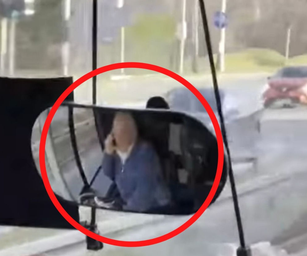 Kierowca rozmawia przez telefon
