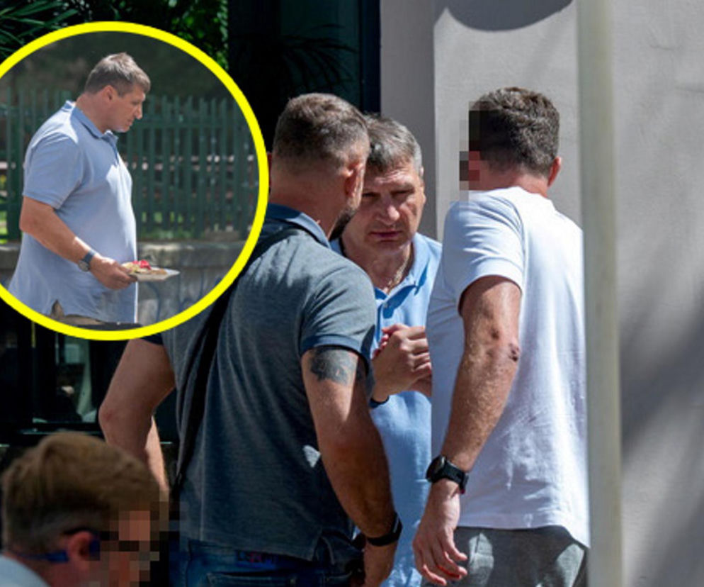 Bokser Andrzej Gołota rozmawia z Pawłem Jóźwiakiem. Na miniaturze Gołota z talerzem jedzenia. Więcej na SE.