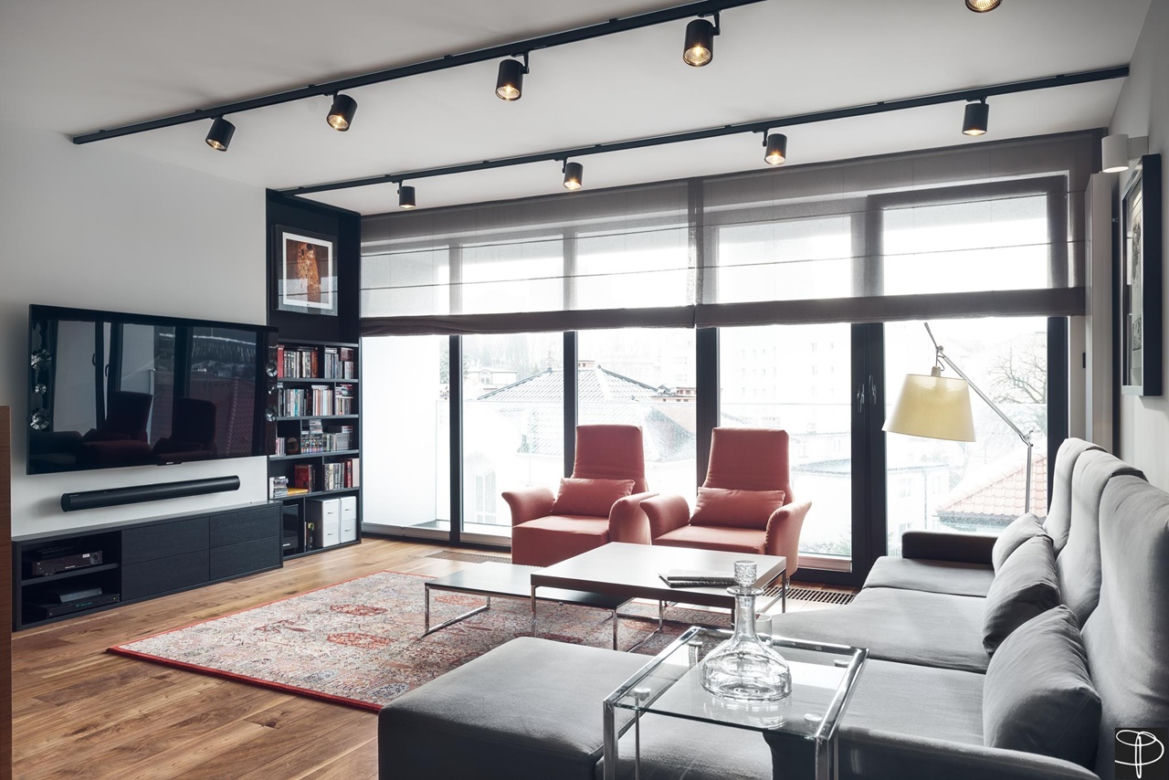 Część wypoczynkowa w męskim apartamencie w stylu nowoczesnym