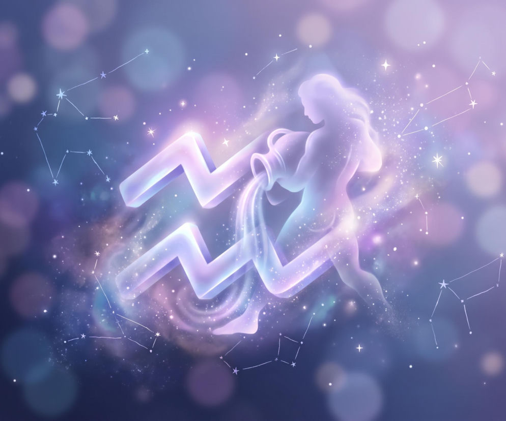 Świecący symbol znaku zodiaku Wodnik na tle kosmosu. O horoskopie dla Wodnika przeczytasz na Eska.