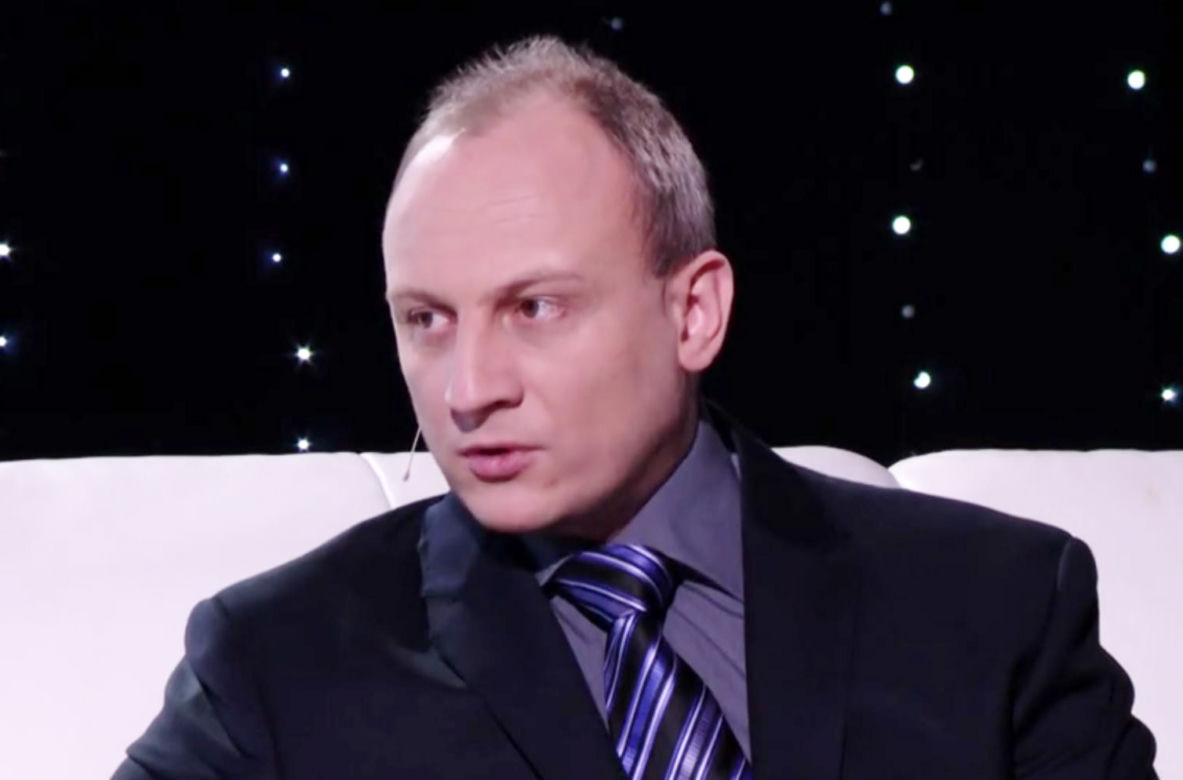 ADAM GOMUŁA