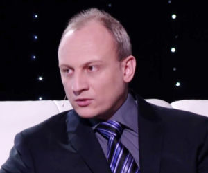 ADAM GOMUŁA