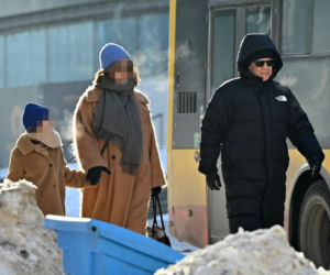 Marek Kondrat z żoną i córką w Warszawie